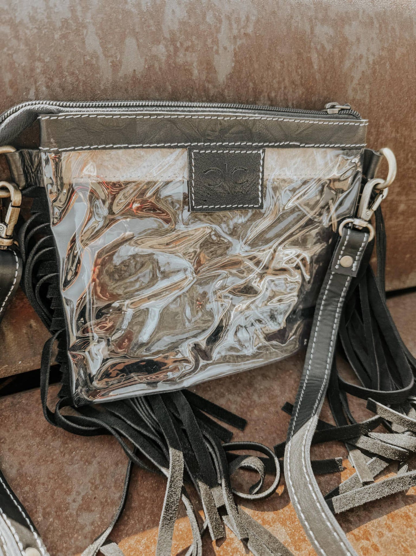 Clear Tooled Leather Fringe Stadium Purse