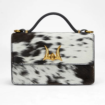 Myra - Valencia Ostrich Leather Bag – Black & White Cowhide