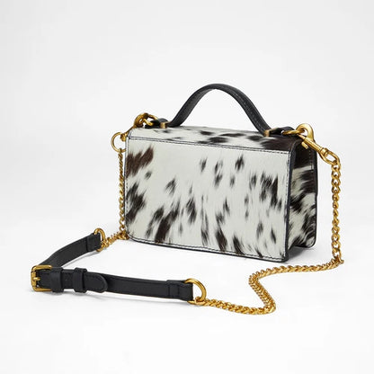 Myra - Valencia Ostrich Leather Bag – Black & White Cowhide